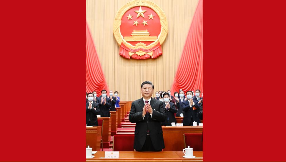 十四届全国人大一次会议举行第三次全体